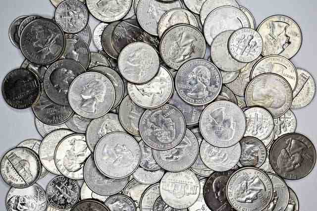 How many quarters make a dollar